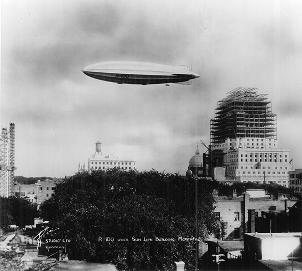 August 1, 1930, after a 16-day transatlantic journey, His Majesty’s Airship R-100 sailed over Montréal and above the Sun Life Building, which was under construction at the time.